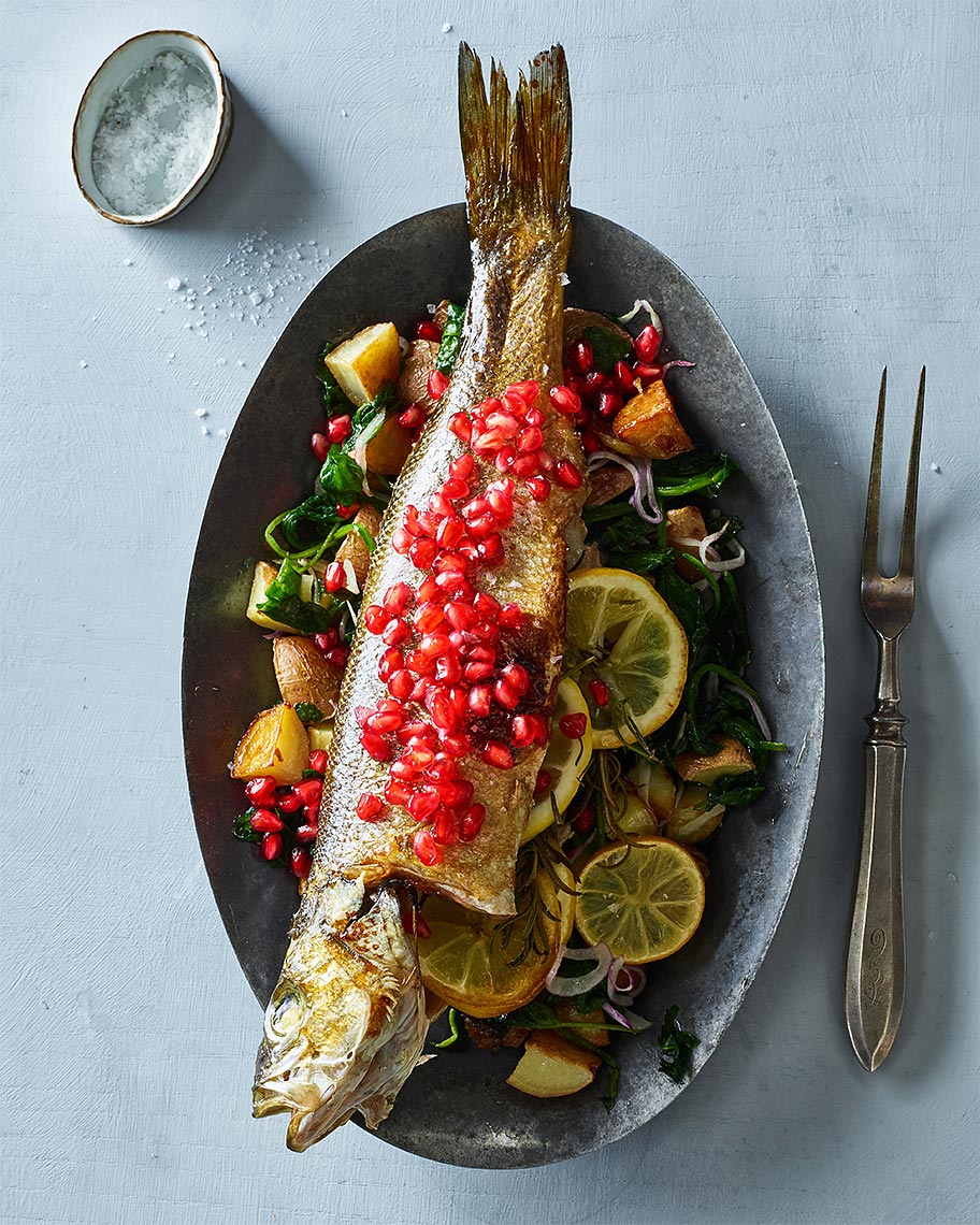 ww18_eric-greenspan_ch6_pomegranate-glazed-whole-branzino-with-wilted-spinach-and-red-bliss-potatoes_1396